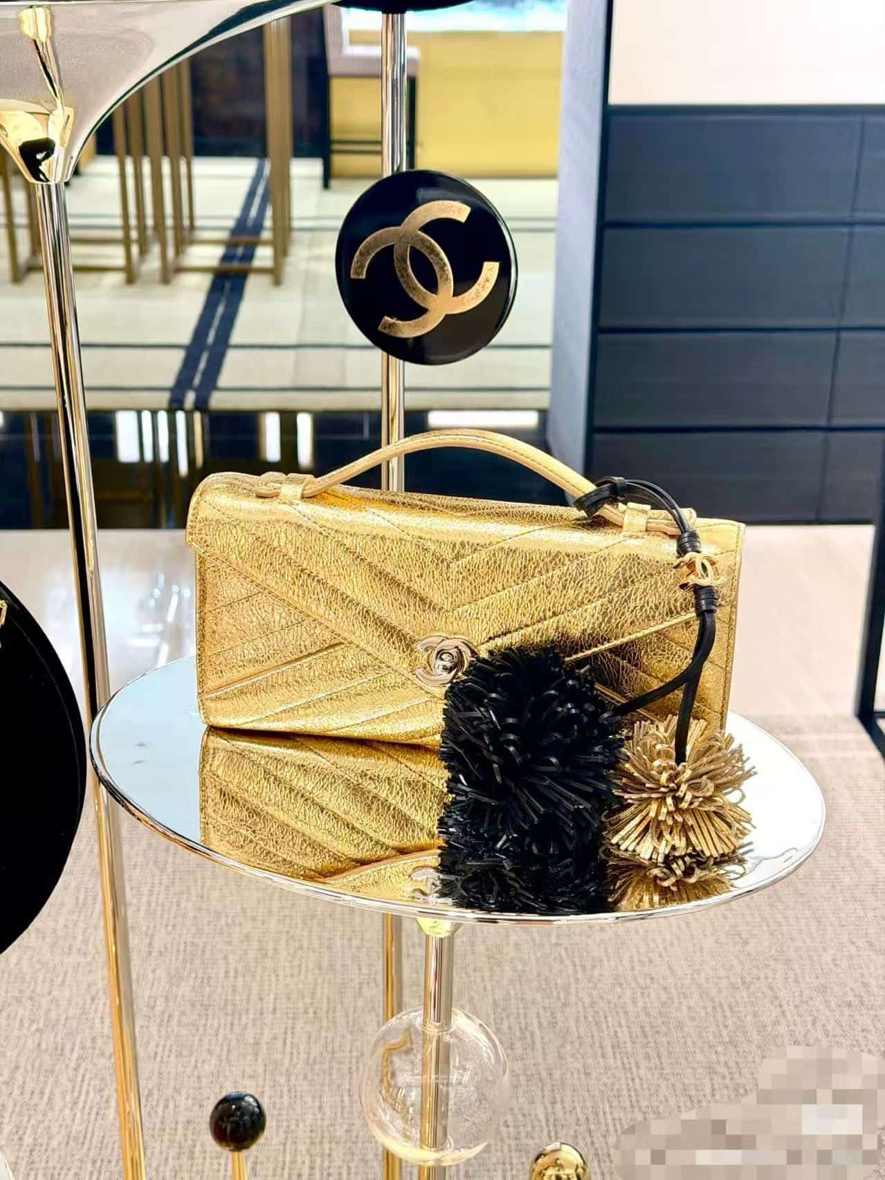 Chanel Flap Bag with Top Handle Metallic Chevron Lambskin Leather Finish& Gold-Tone Metal Gold AS6044 A