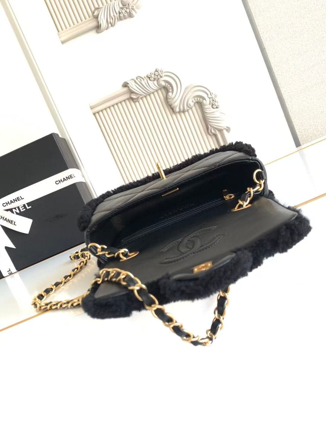 Chanel Mini Shearling Flap Bag in Black lambskin with black shearling & Gold-Tone Metal AS5148 A