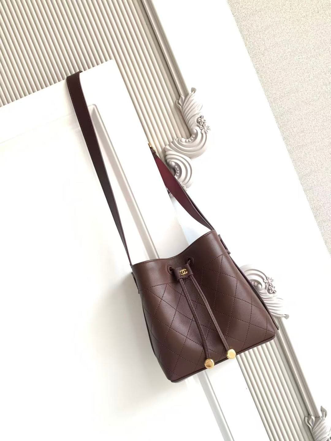 Chanel Small Bucket Bag Calfskin Leather & Gold-Tone Metal Dark Brown AS6537 A