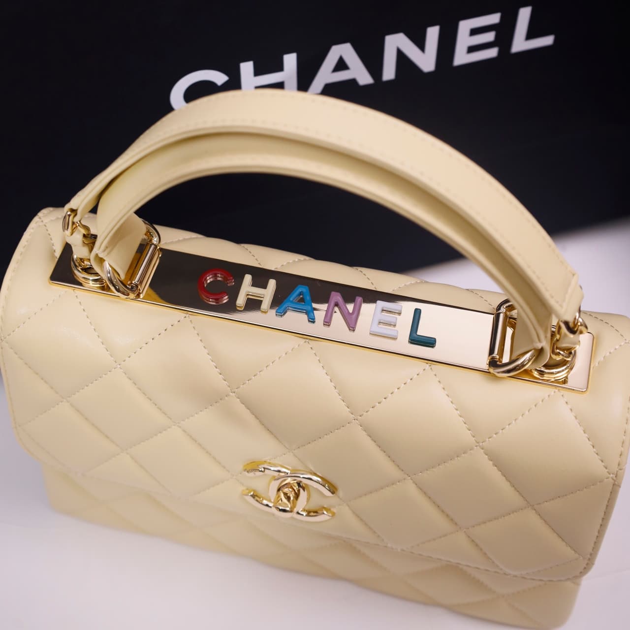 SMALL FLAP BAG WITH TOP HANDLE Lambskin Gold Metal Light Yellow A