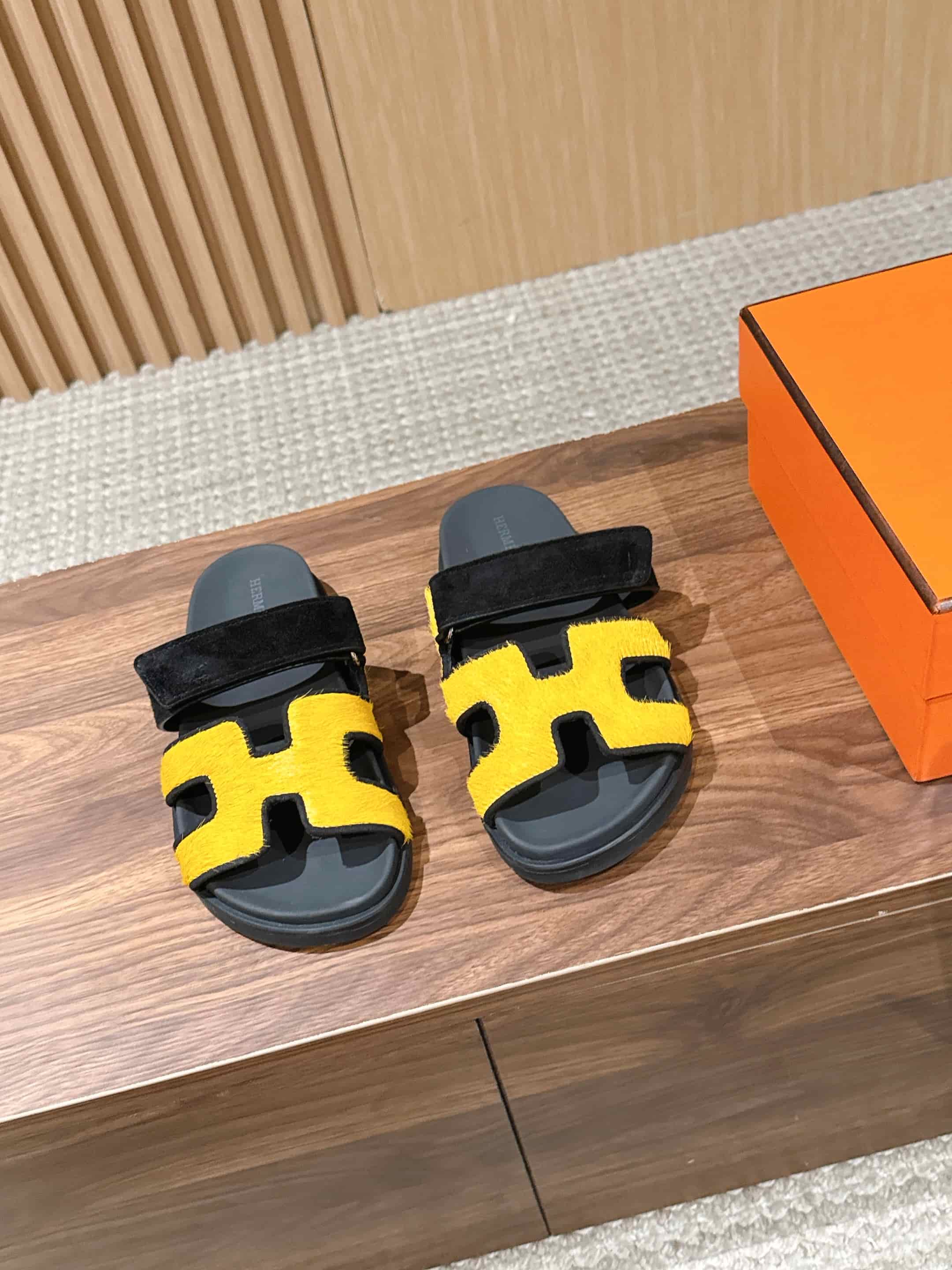 Hermès Chypre sandals in yellow suede with black accents Women Men