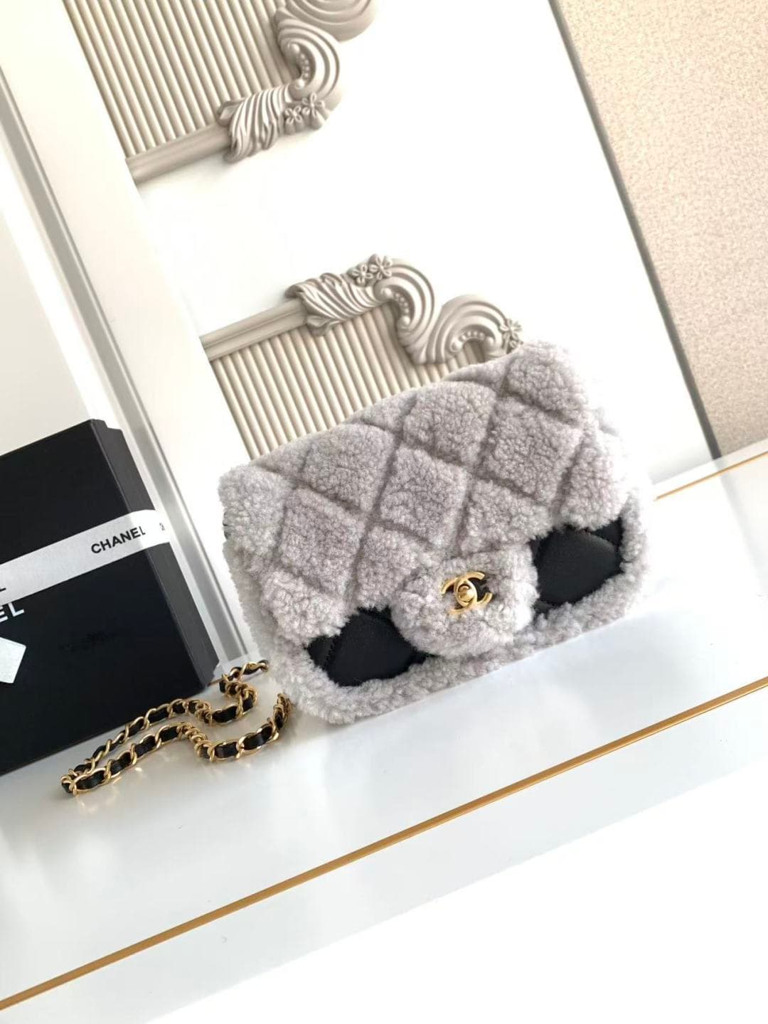 Chanel Mini Shearling Flap Bag in Black lambskin with grey shearling & Gold-Tone Metal AS5148 A