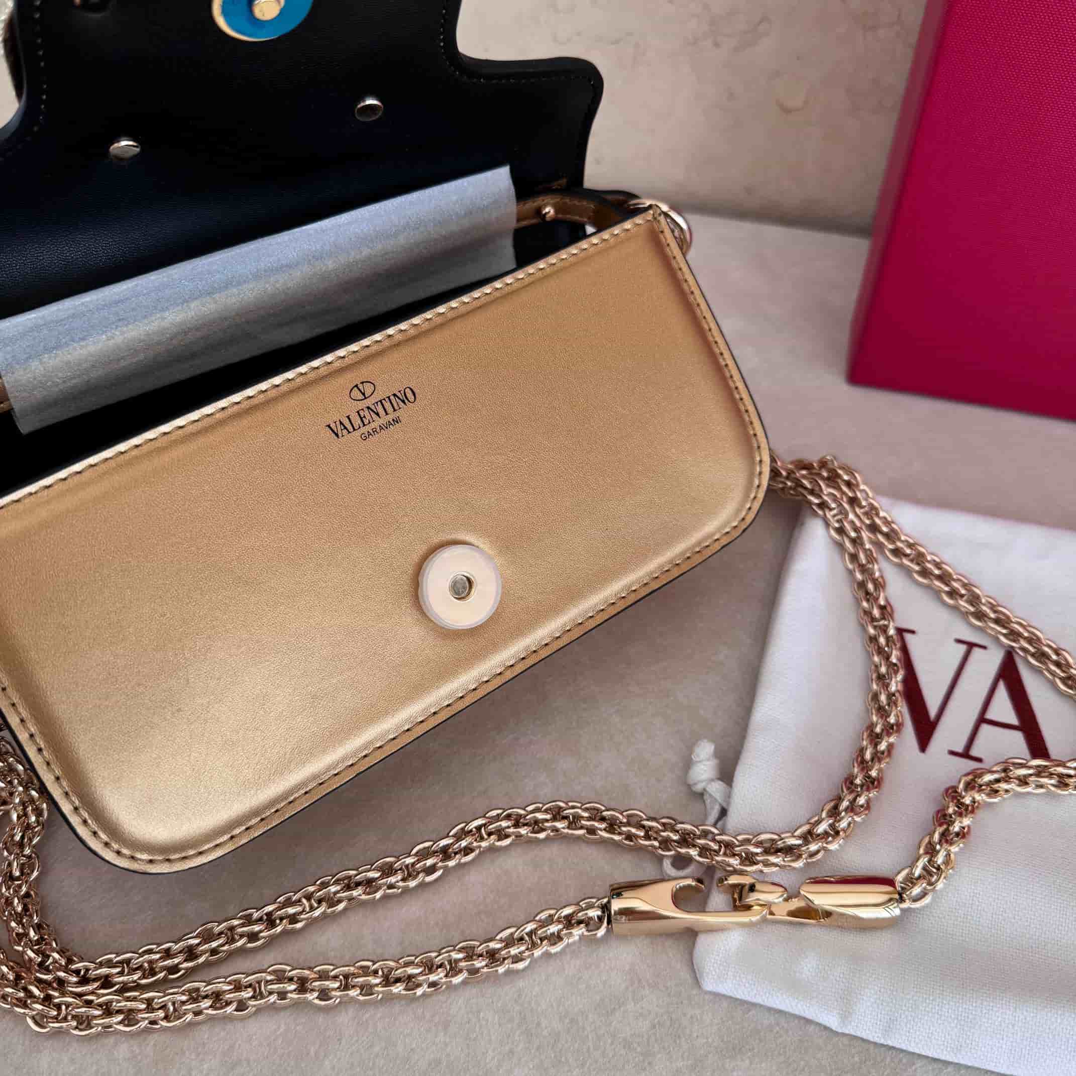 Valentino Garavani Locò Mini leather shoulder bag with crystal VLogo High
