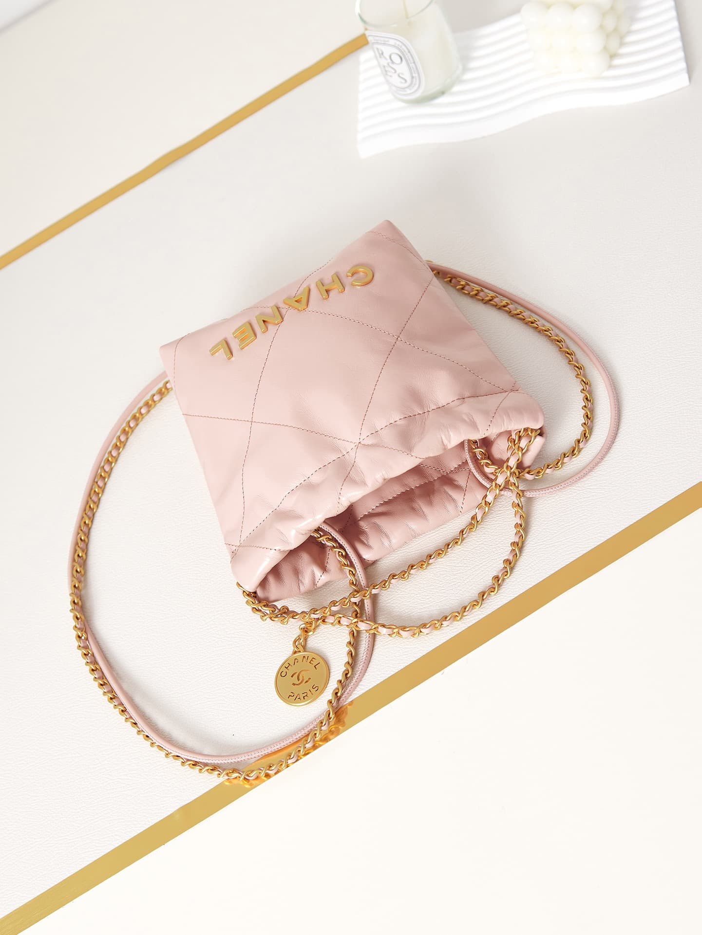 Chanel 22 MINI HANDBAG Shiny Calfskin Pink & Gold-Tone Metal AS3980 A
