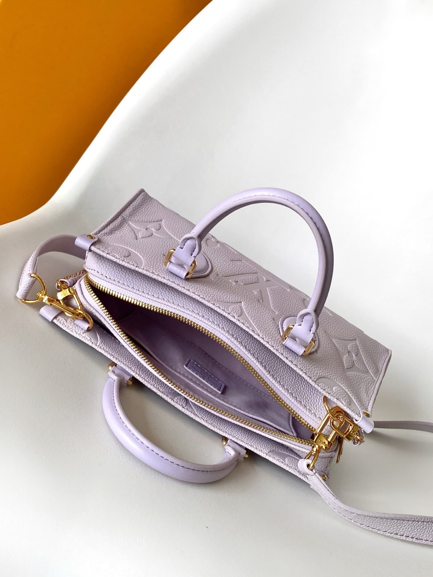 Louis Vuitton OnTheGo East West Misty Lilac Embossed grained cowhide leather M15192 High
