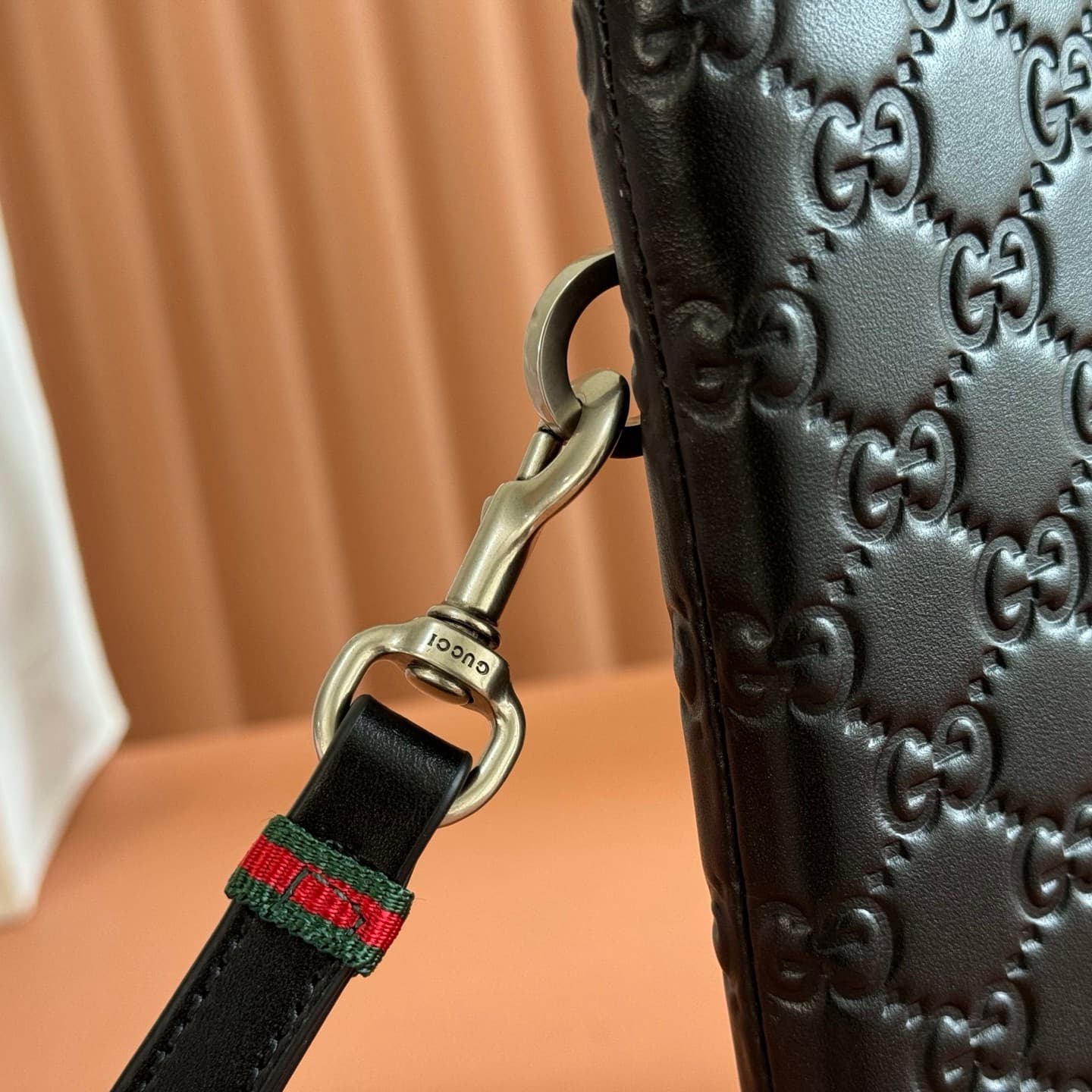 Gucci GG Emblem medium pouch Black embossed GG leather ‎850223 High