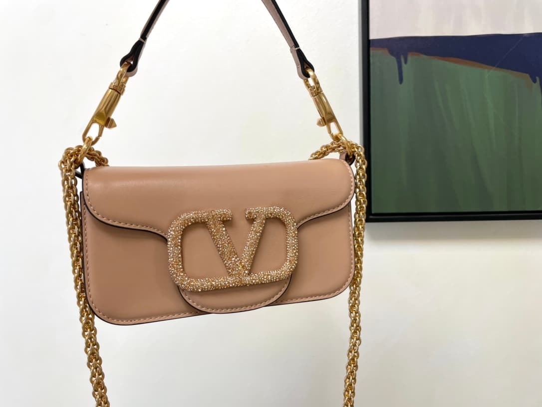 Valentino Garavani Locò Mini leather shoulder bag with crystal VLogo High
