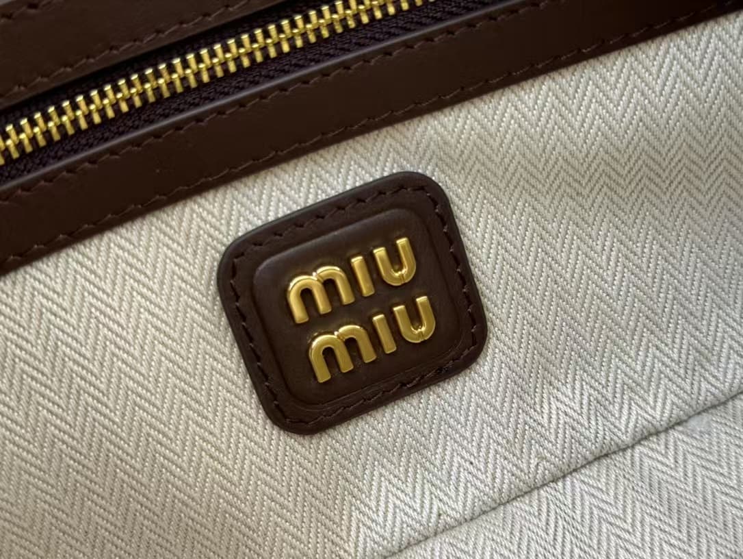 Miu Miu Arcadie padded suede top-handle bag High