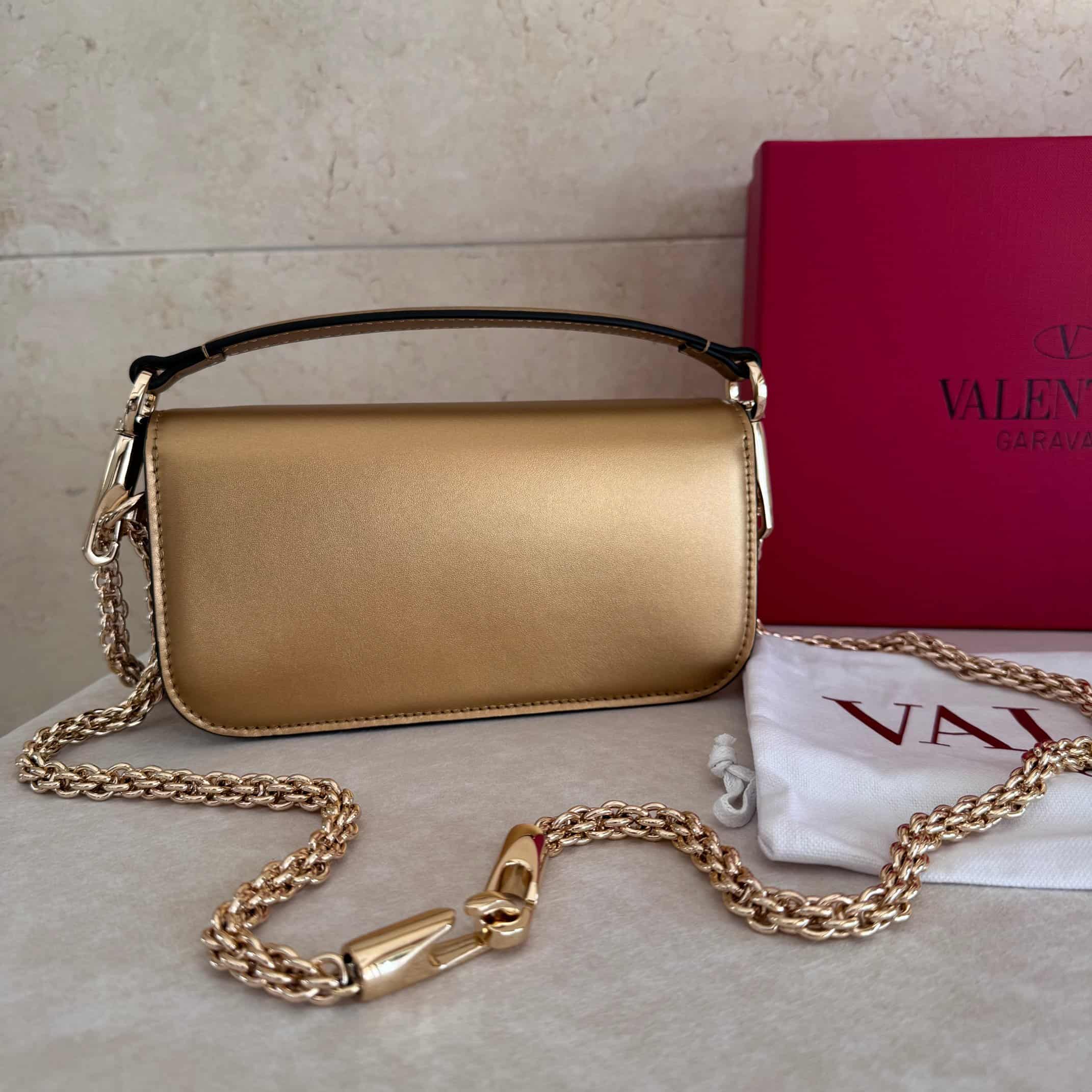 Valentino Garavani Locò Mini leather shoulder bag with crystal VLogo High