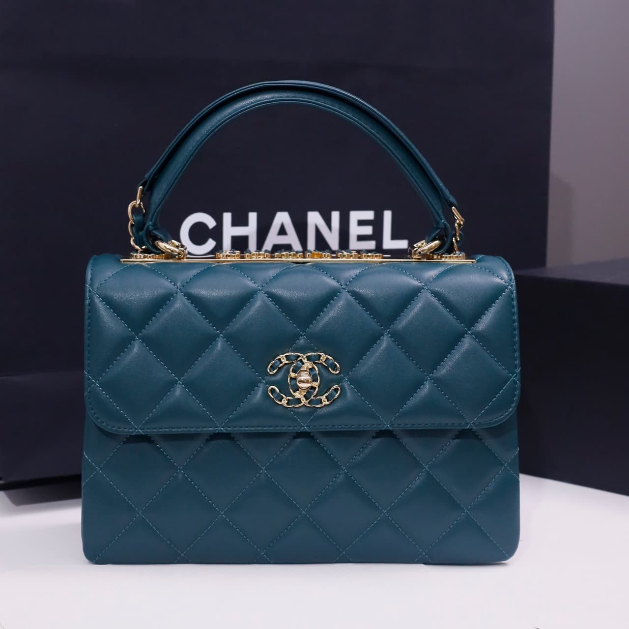 SMALL FLAP BAG WITH TOP HANDLE Lambskin Gold Metal Deep Blue A