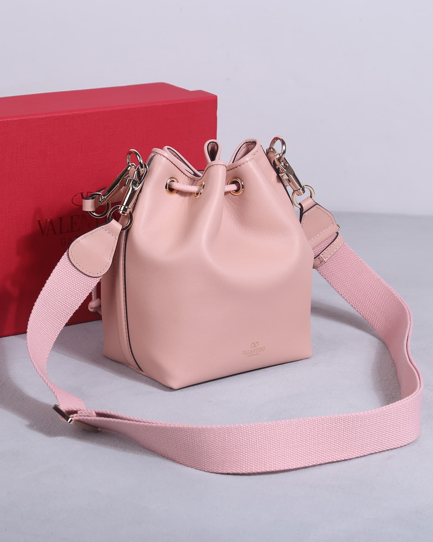 Valentino Garavani Locò calfskin leather bucket bag in soft pink 22058 High