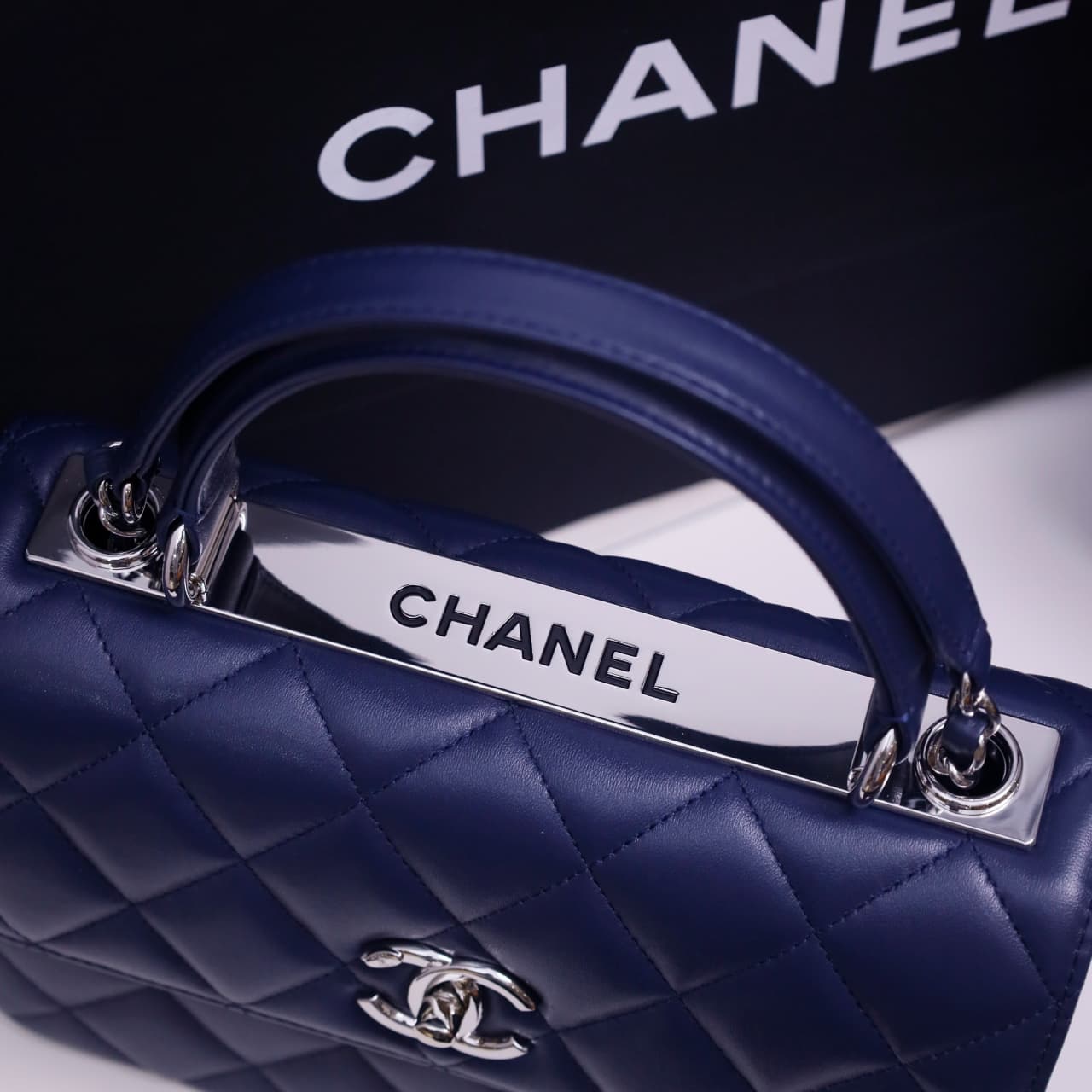 SMALL FLAP BAG WITH TOP HANDLE Lambskin Silver Metal Drak Blue A