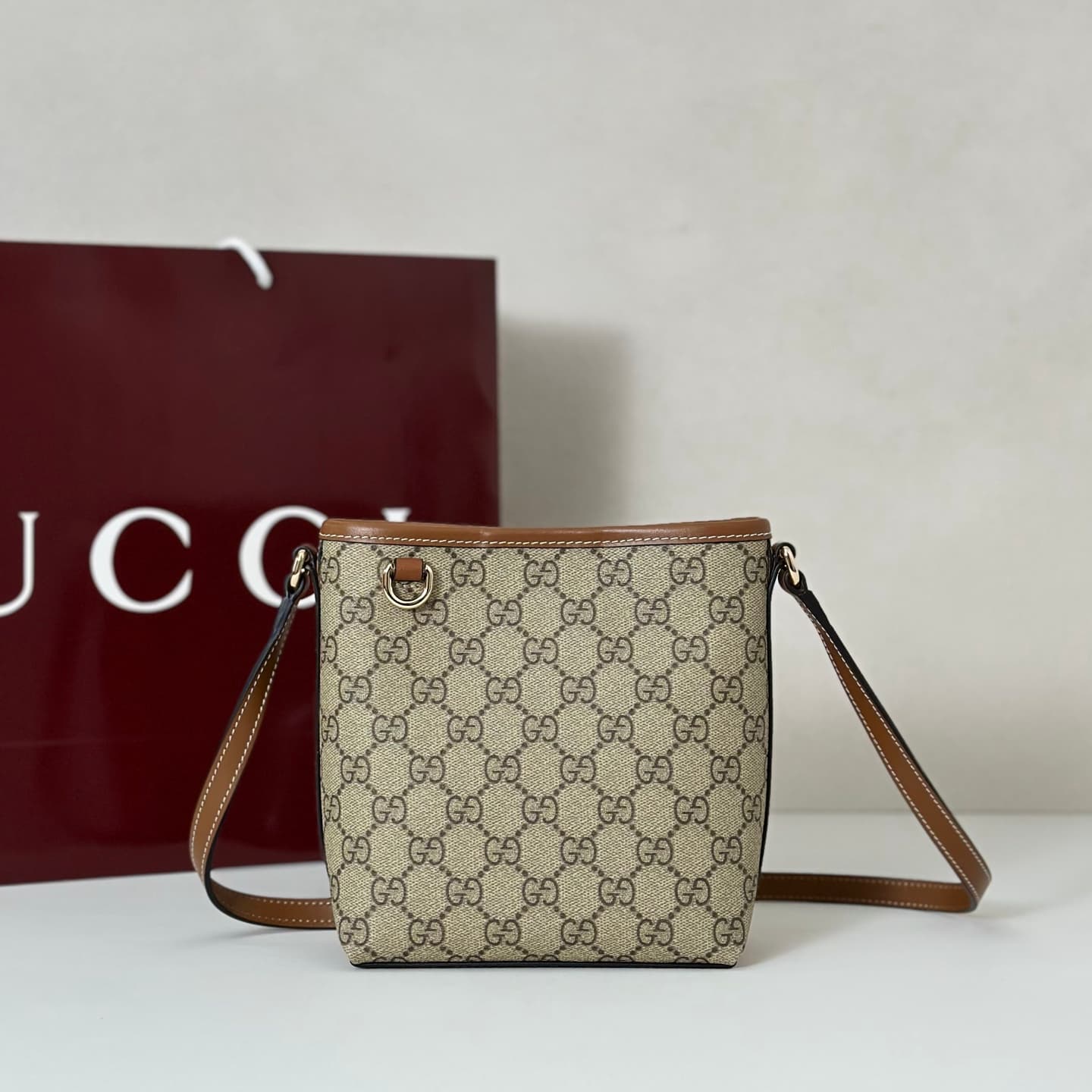 Gucci GG Emblem nano bucket bag 847090 beige and dark brown fabric High