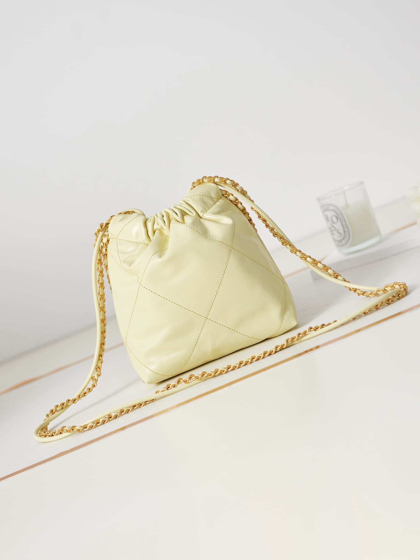 Chanel 22 MINI HANDBAG Shiny Calfskin Light Yellow & Gold-Tone Metal AS3980 A