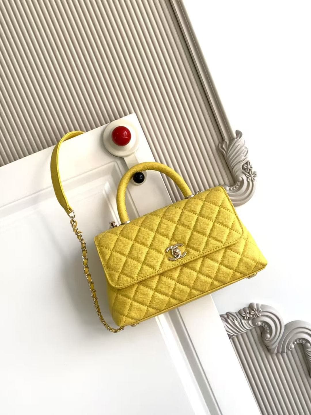 FLAP BAG WITH TOP HANDLE Grained Calfskin & Gold-Tone Metal A92990 Yellow Binding A