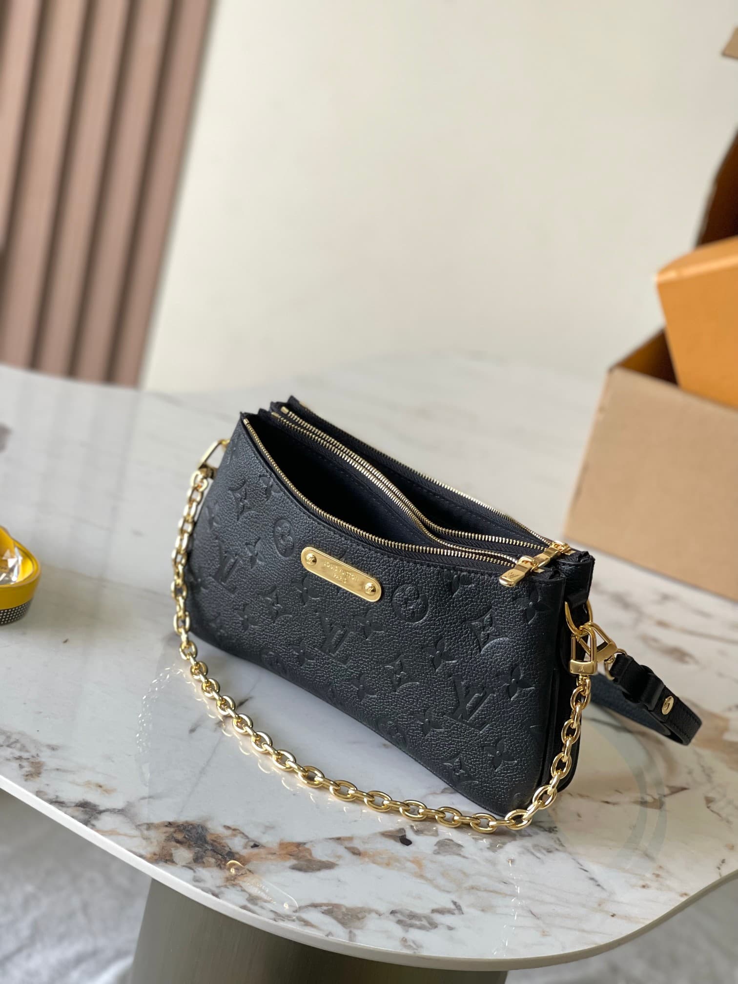 Louis Vuitton Pochette Liv Black Monogram Empreinte embossed supple grained cowhide leather M83301 TOP