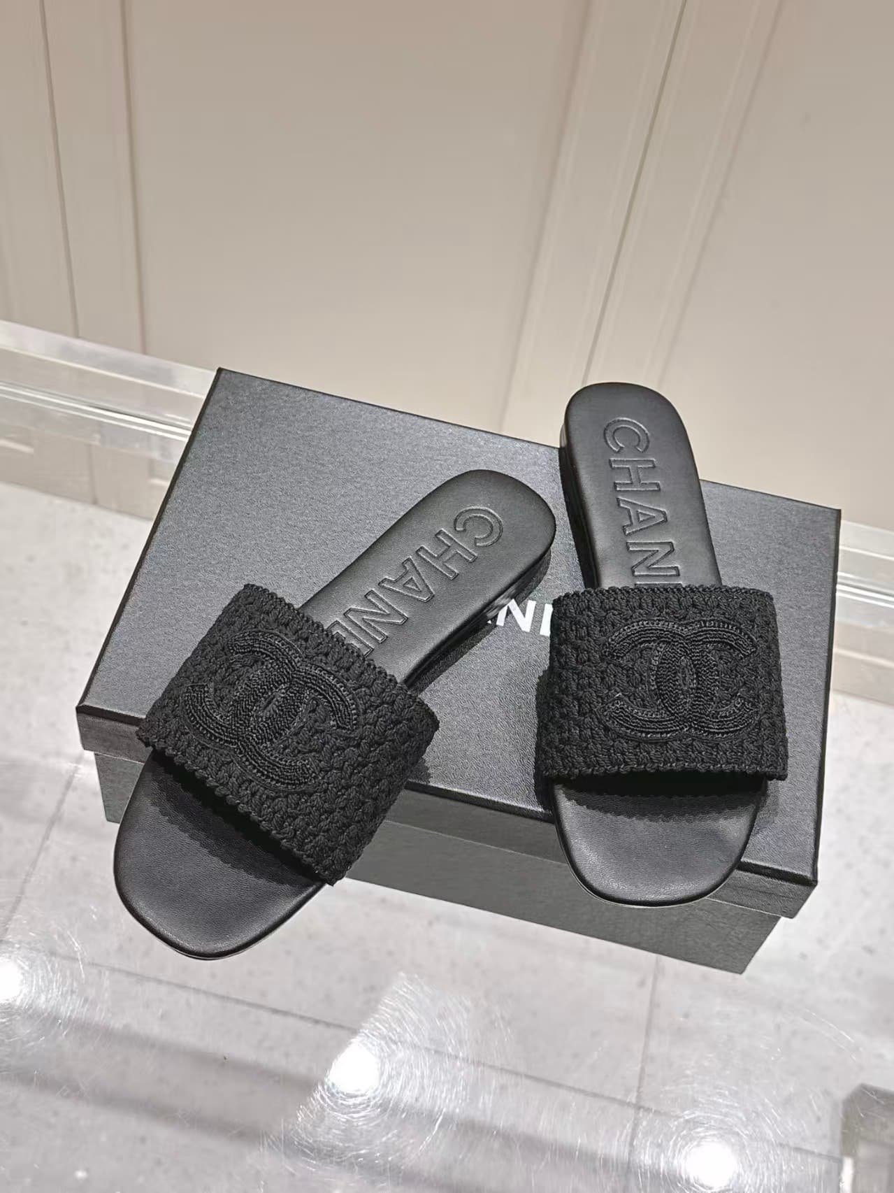 Chanel black crochet CC mules
