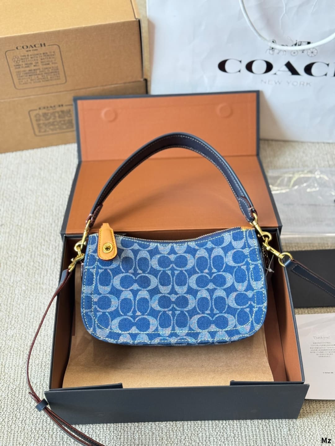 Coach Swinger In Signature Denim