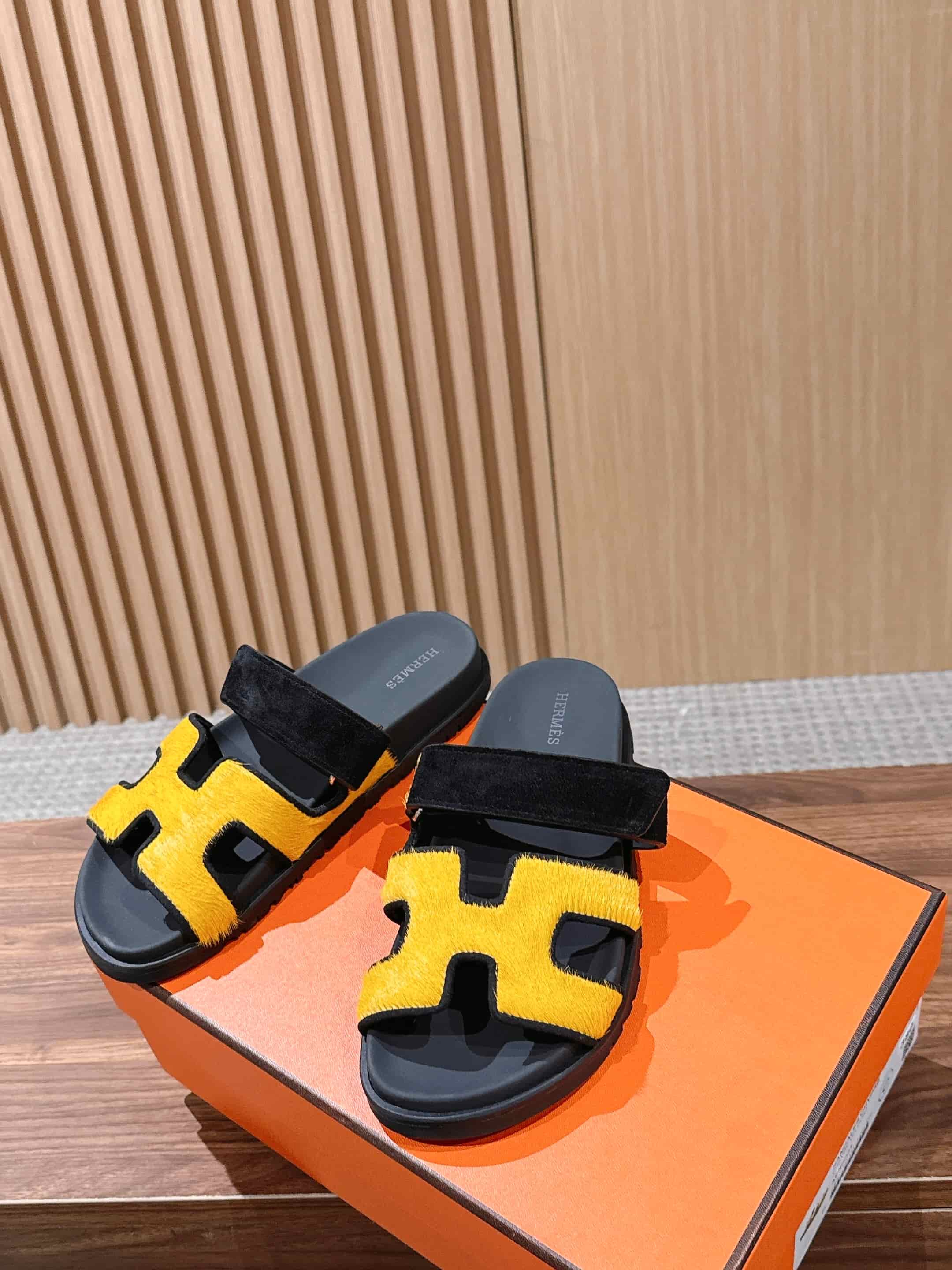 Hermès Chypre sandals in yellow suede with black accents Women Men
