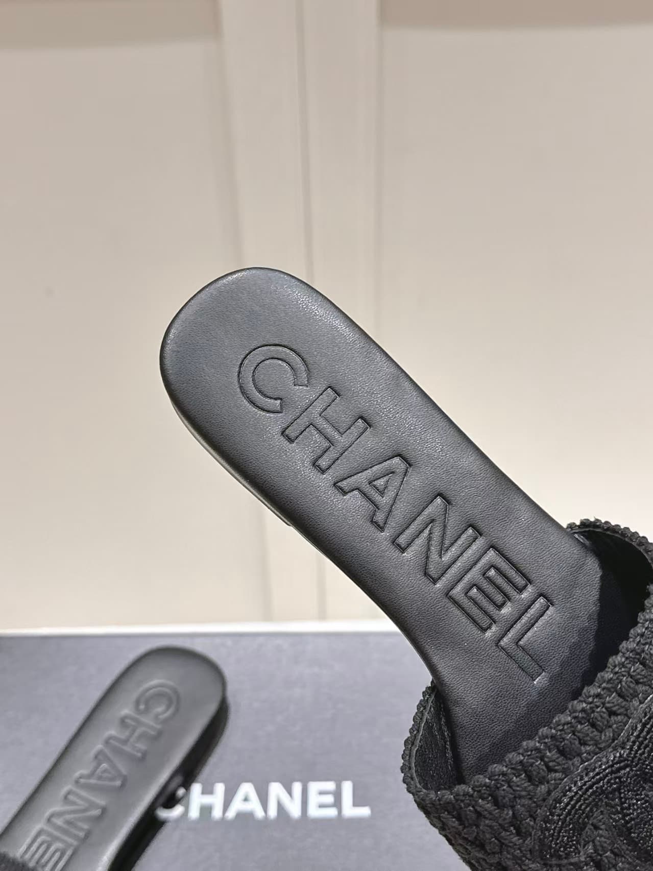 Chanel black crochet CC mules
