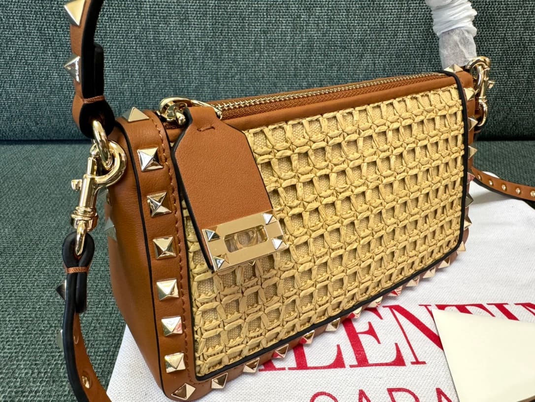 Valentino Garavani Rockstud Raffia and leather crossbody clutch High