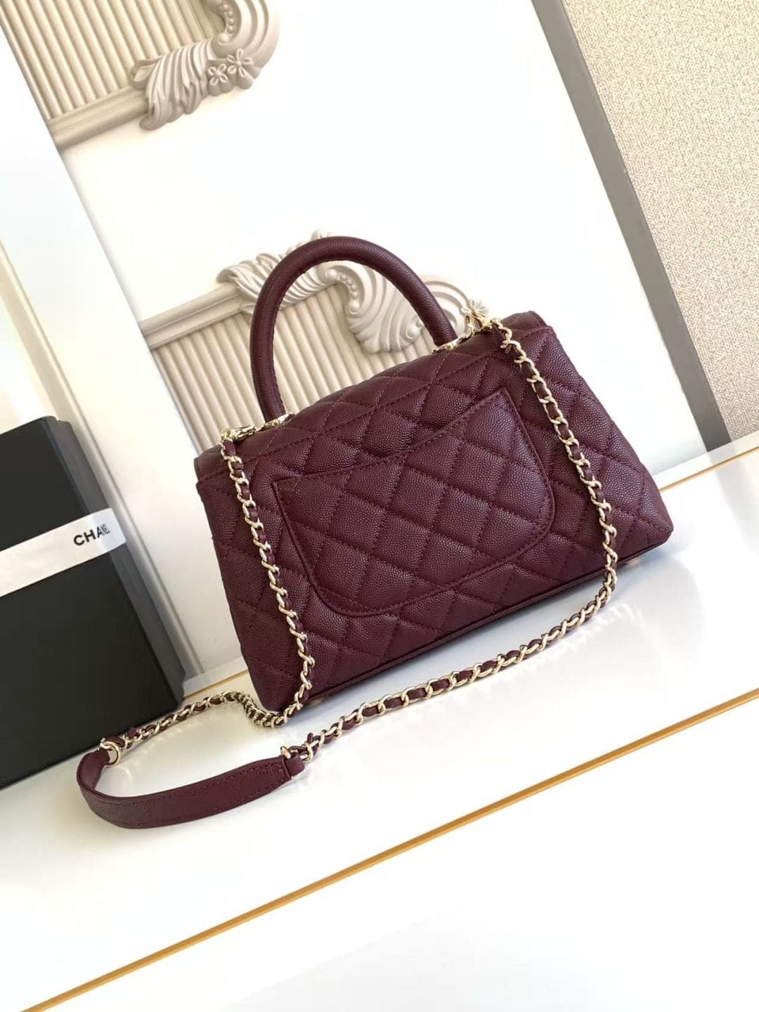 FLAP BAG WITH TOP HANDLE Grained Calfskin & Gold-Tone Metal A92990 Burgundy Binding A