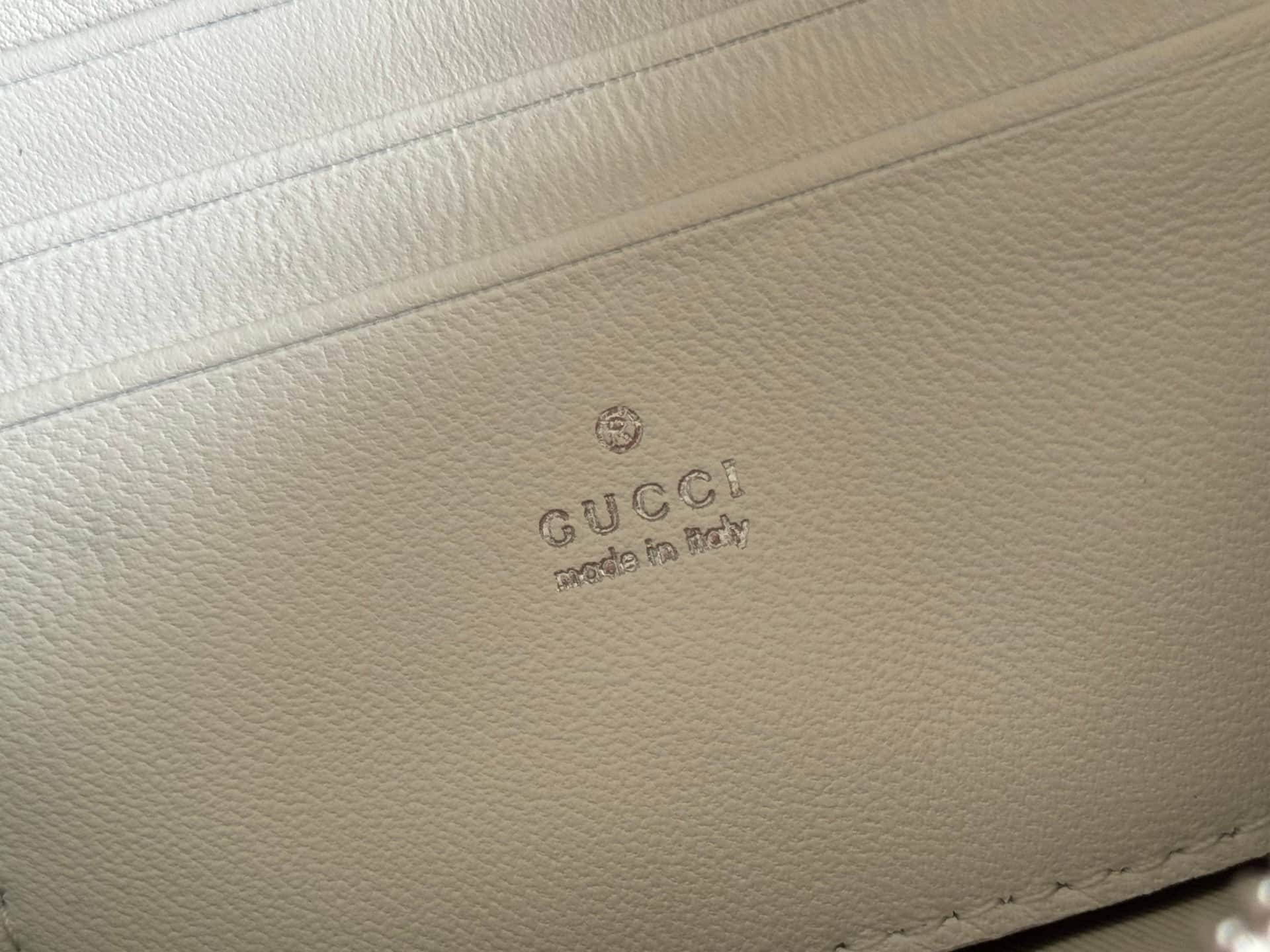 Gucci GG Marmont pouch with strap White vertical matelassé nappa leather A006X2 High