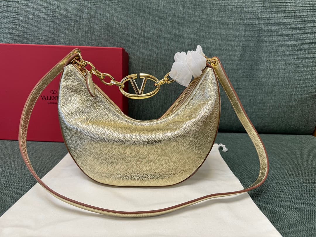 Valentino Garavani VLogo Moon small hobo bag in Gold grained calfskin High