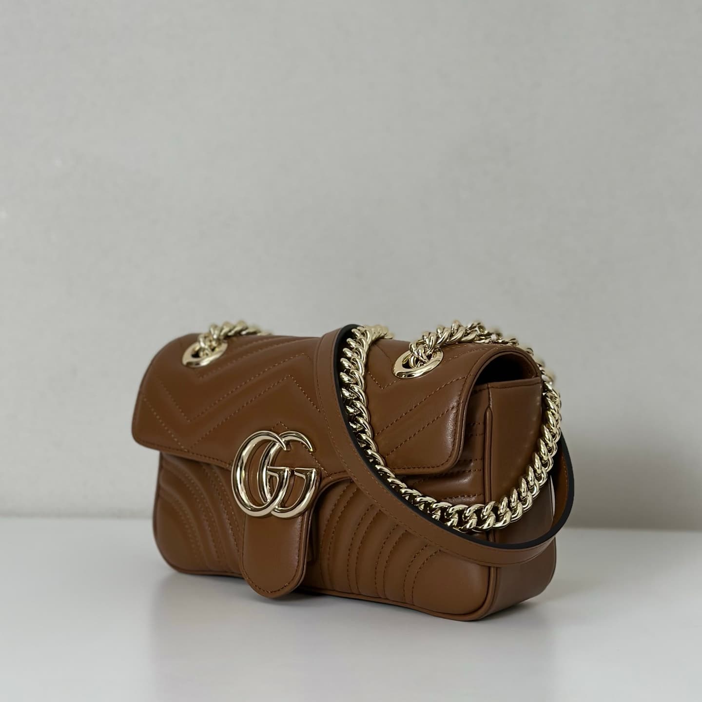 GG Marmont mini matelassé shoulder bag brown leather 446744 high