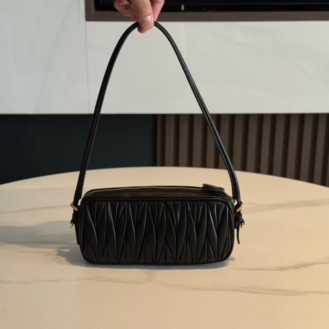 Miu Miu Black Matelassé Nappa Leather Pouch High
