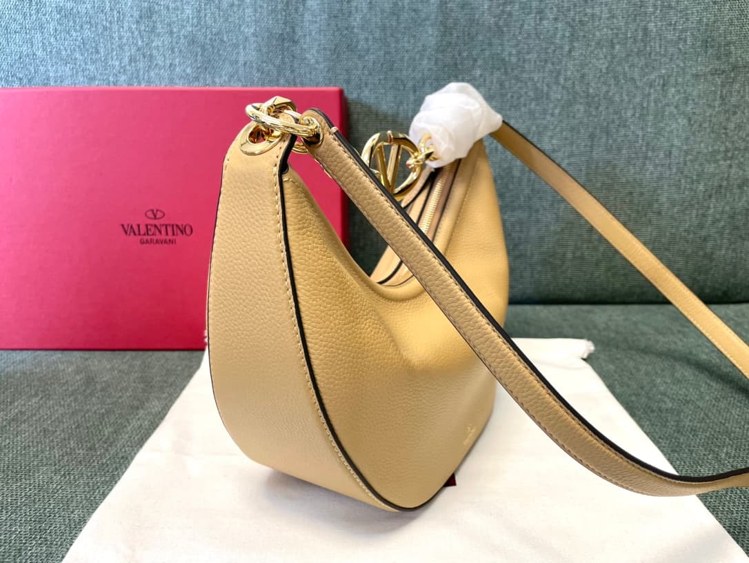 Valentino Garavani VLogo Moon small hobo bag in beige grained calfskin High
