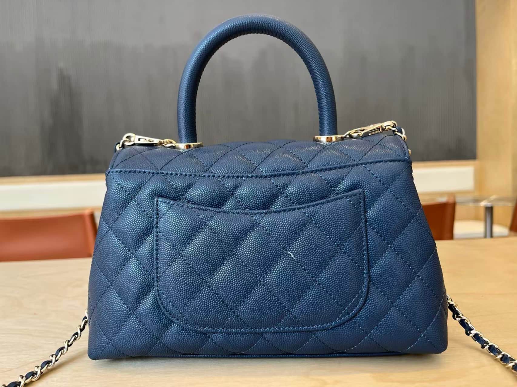 FLAP BAG WITH TOP HANDLE Grained Calfskin & Gold-Tone Metal A92990 Navy Binding A