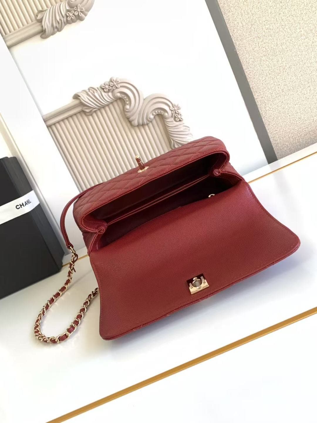 FLAP BAG WITH TOP HANDLE Grained Calfskin & Gold-Tone Metal A92990 Red Binding A