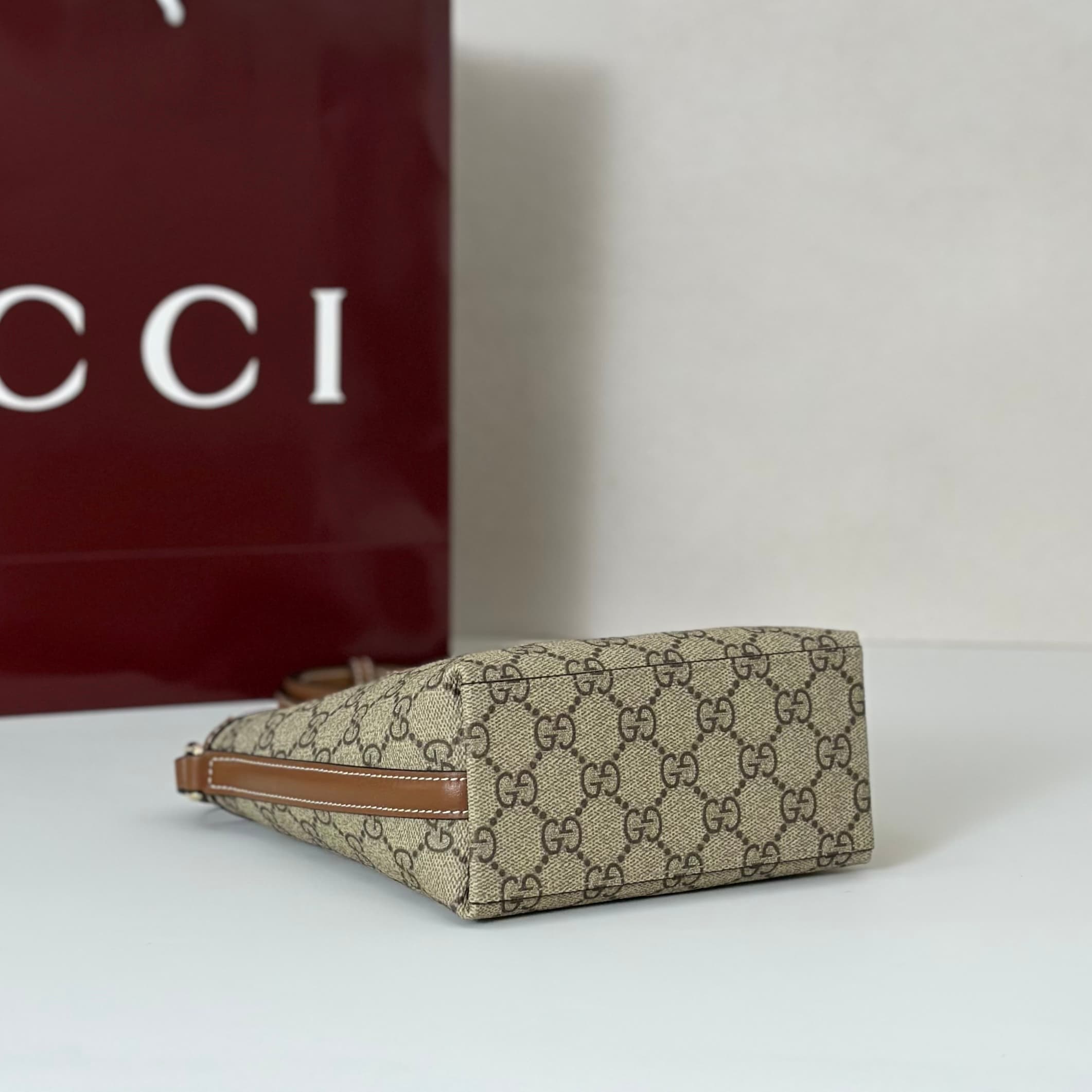 Gucci GG Emblem nano bucket bag 847090 beige and dark brown fabric High
