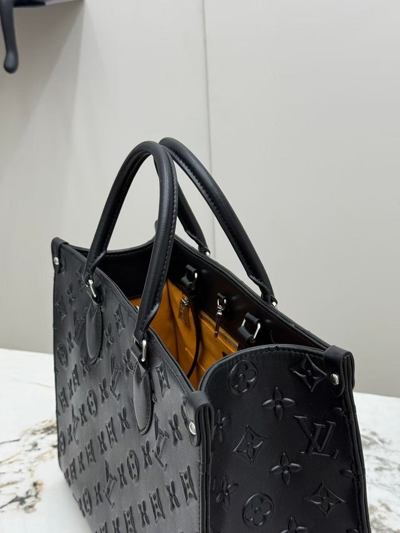 Louis Vuitton OnTheGo MM in Black Embossed Monogram High