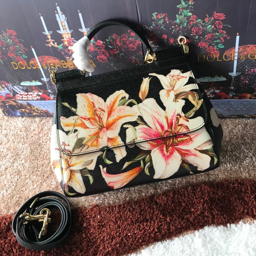 Dolce & Gabbana Miss Sicily top handle bag with vibrant white and pink lily floral print leather High