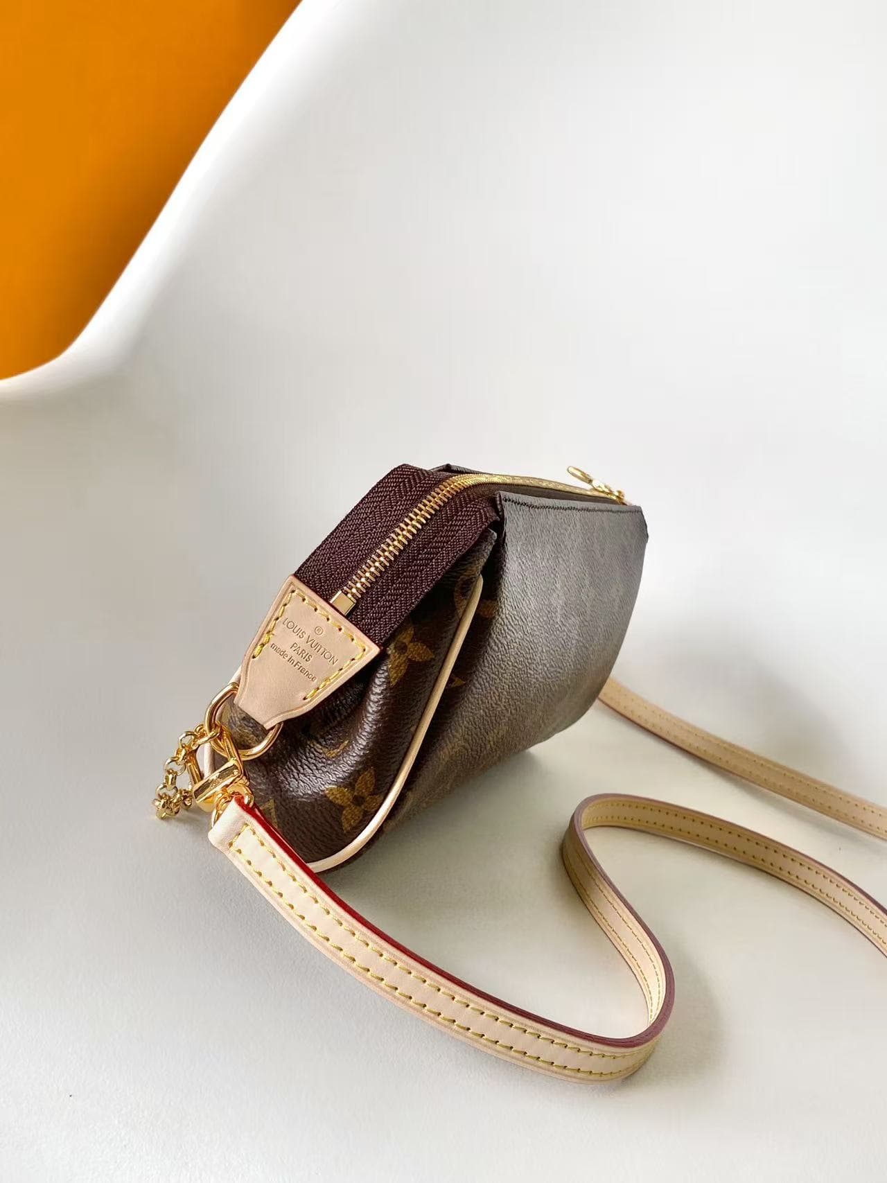Louis Vuitton Pochette Eva Monogram coated canvas M13567 High