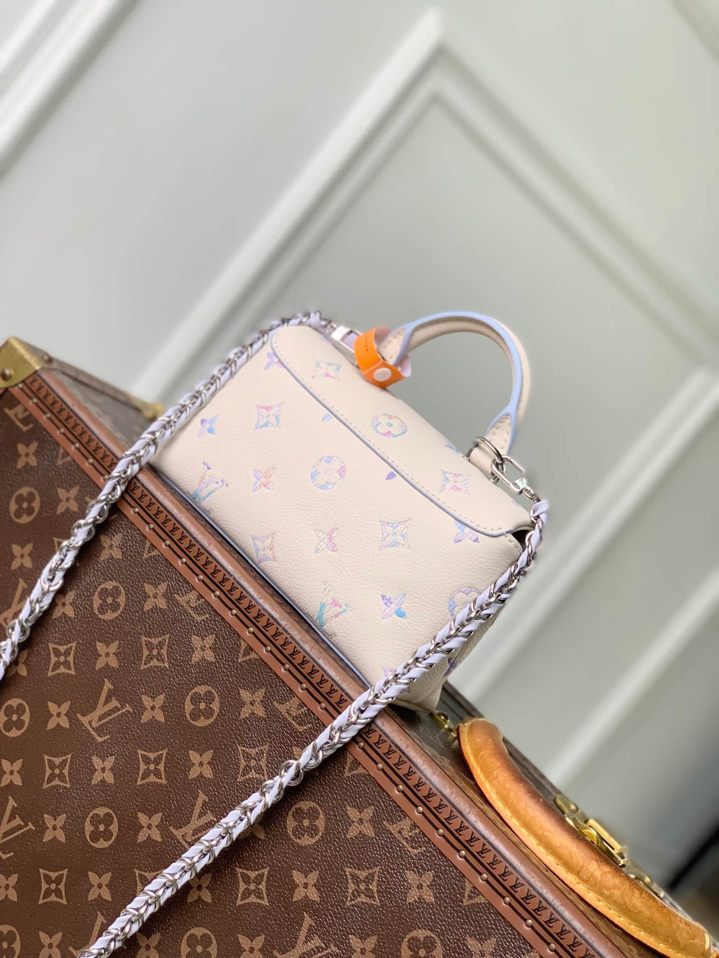 Louis Vuitton Nano Madeleine Monogram Empreinte Link Quartz Cowhide leather M2A374 High