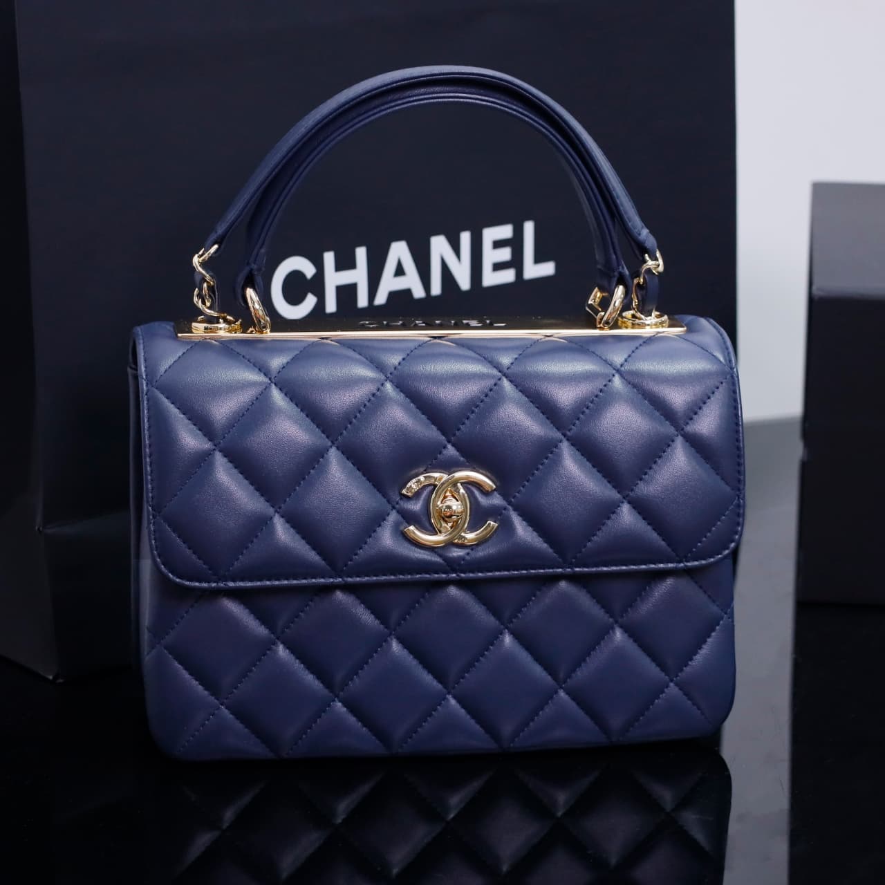 SMALL FLAP BAG WITH TOP HANDLE Lambskin Gold Metal Dark Blue A