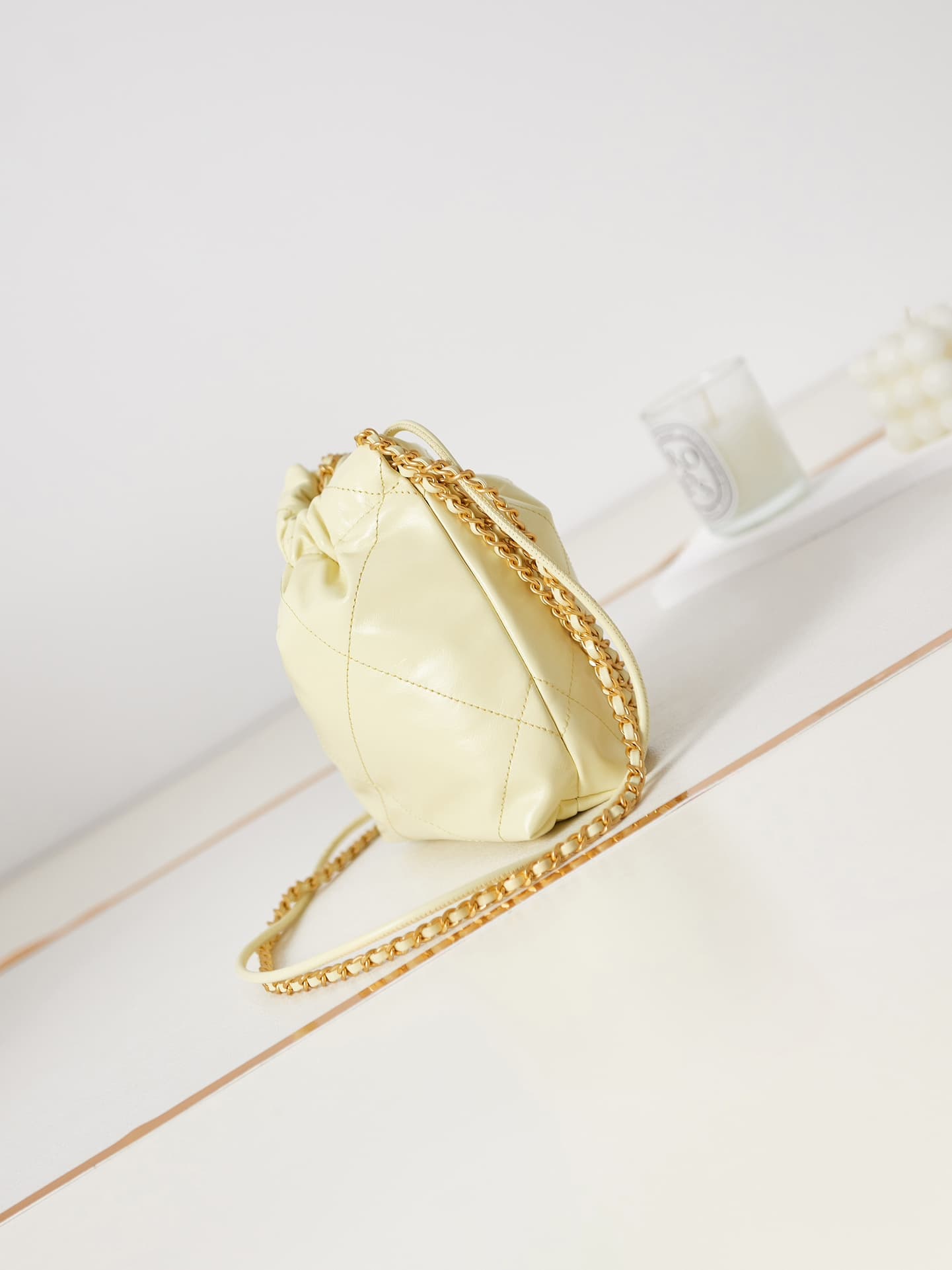 Chanel 22 MINI HANDBAG Shiny Calfskin Light Yellow & Gold-Tone Metal AS3980 A