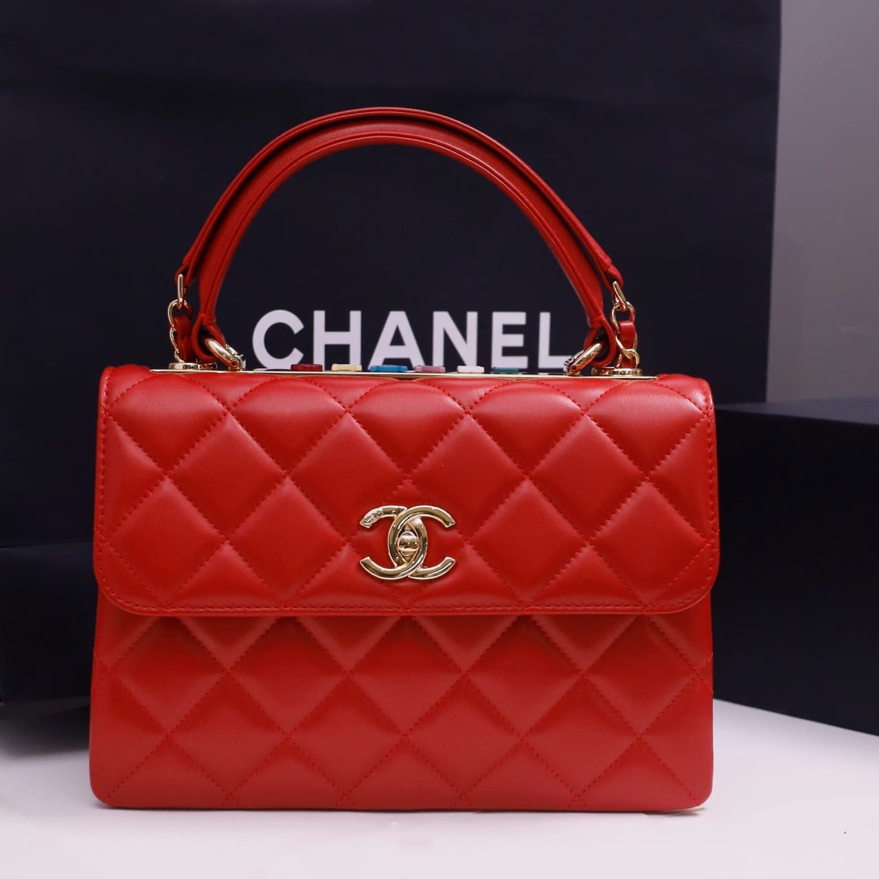 SMALL FLAP BAG WITH TOP HANDLE Lambskin Gold Metal Red A