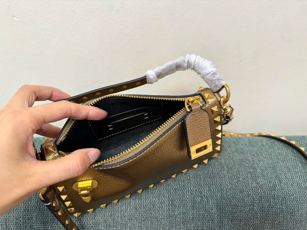 Valentino Garavani Mini Rockstud crossbody bag in Gold Grained Metallic Leather High