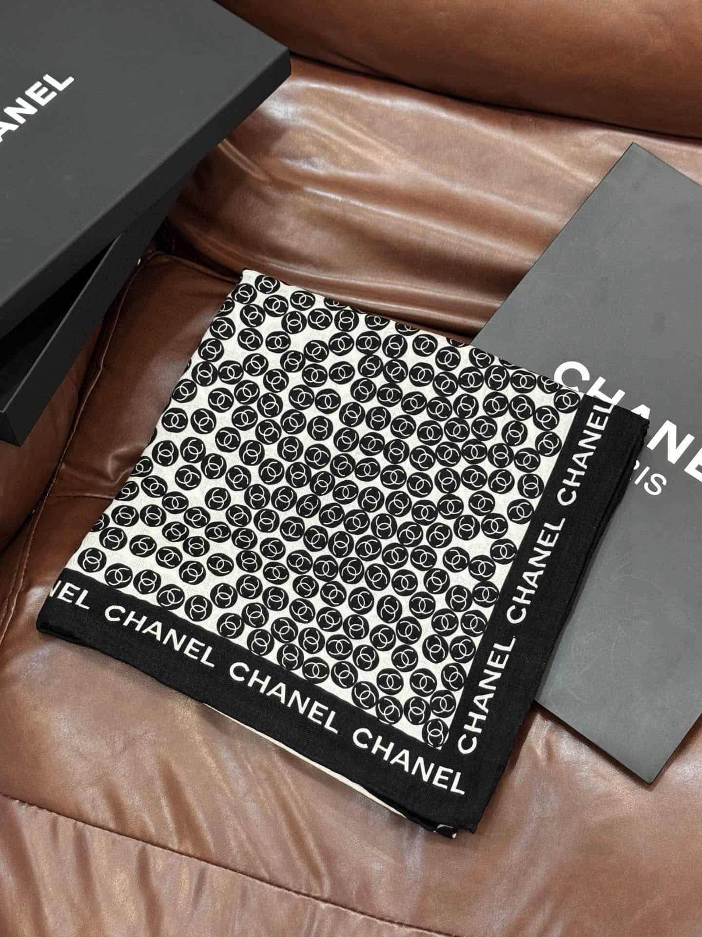 Chanel silk scarf featuring polka dot pattern