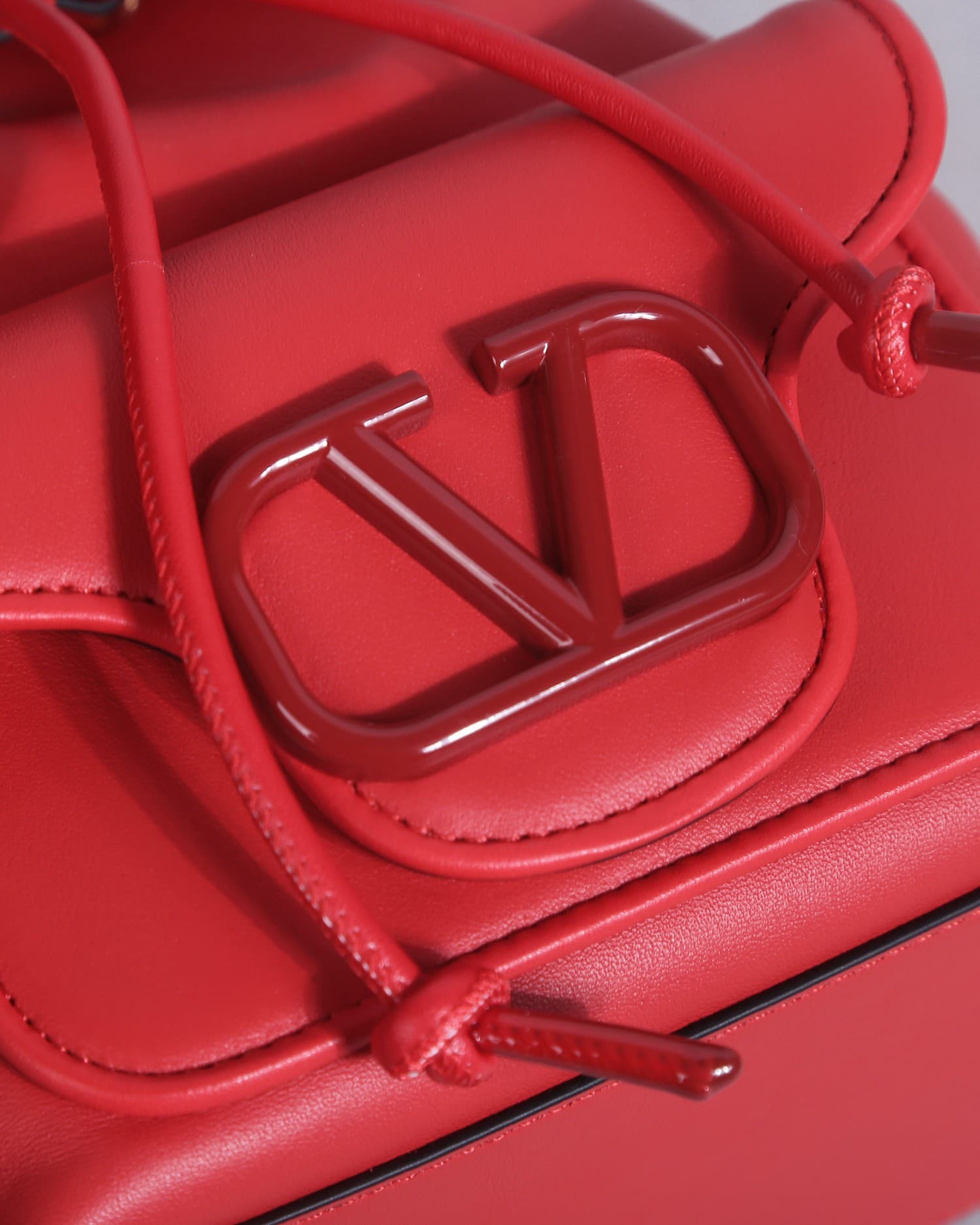 Valentino Garavani Locò calfskin leather bucket bag in red 22058 High