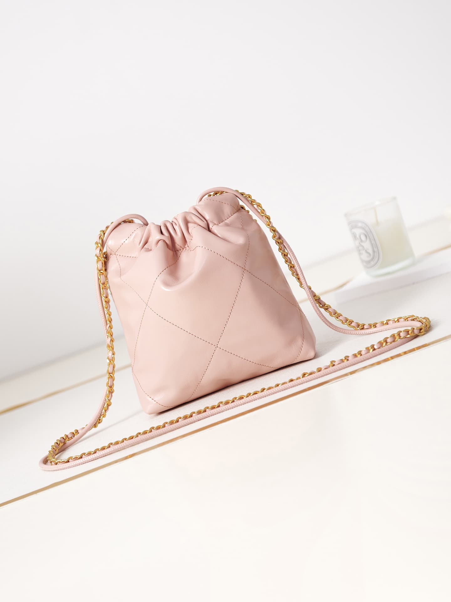 Chanel 22 MINI HANDBAG Shiny Calfskin Pink & Gold-Tone Metal AS3980 A