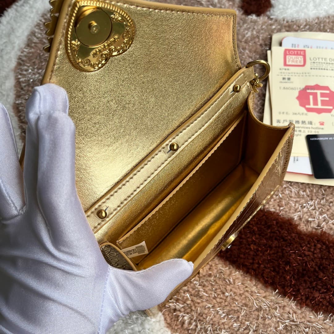 Dolce & Gabbana Small Devotion bag in crocodile-effect calfskin Gold High