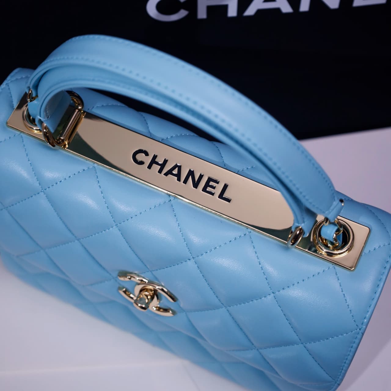 SMALL FLAP BAG WITH TOP HANDLE Lambskin Gold Metal Sky Blue A
