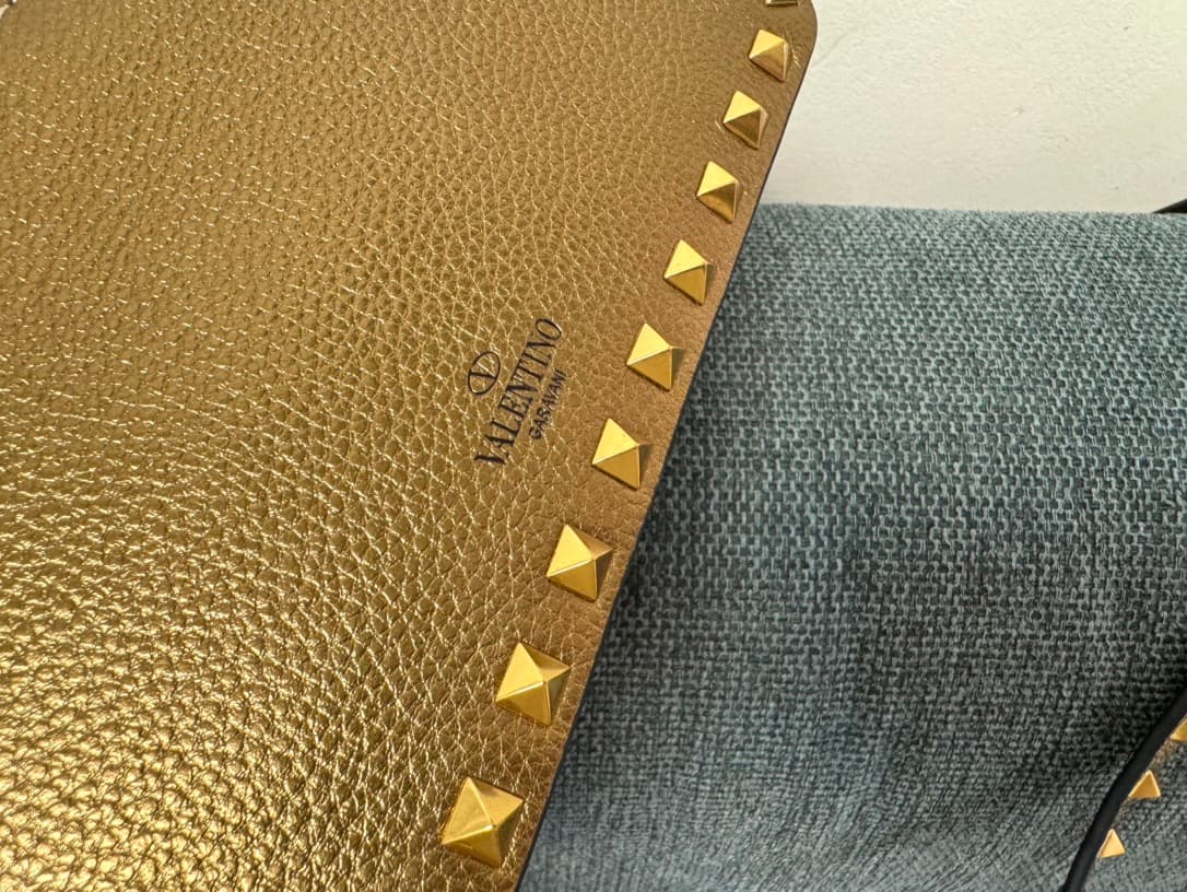 Valentino Garavani Mini Rockstud crossbody bag in Gold Grained Metallic Leather High