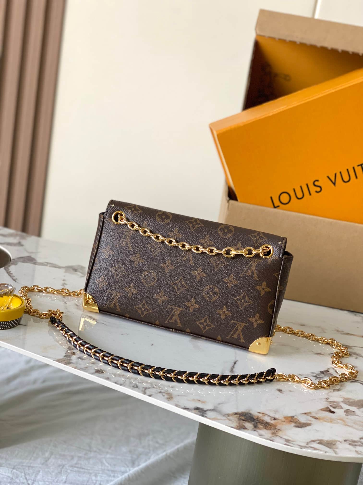 Louis Vuitton Trunkie East West Monogram coated canvas M27266 TOP
