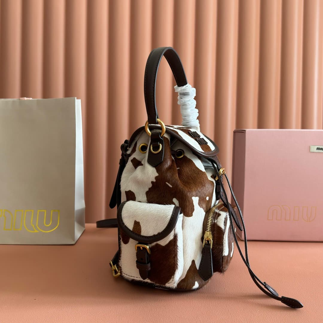 Miu Miu Calf Hair Backpack in brown and white cow print 5BZ043 TOP
